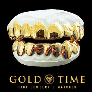 Solid gold 20 piece grillz set, 10 top and 10 bottom, with a mirror polish finish
