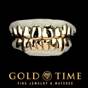 Yellow gold 8 top and 8 bottom solid perm cut grillz on dental molds