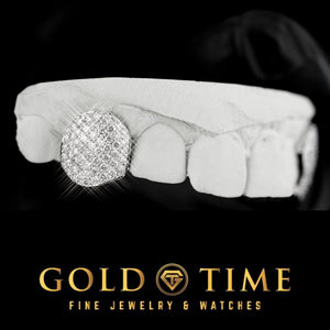 Close view of one honeycomb moissanite fang cap showing the handset pavé stones