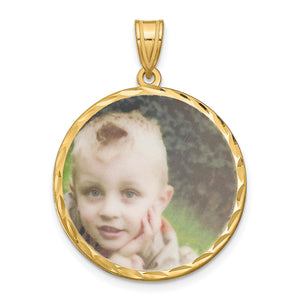 Gold plated round photo pendant with a child's photo inside a diamond-cut frame
