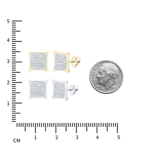 Kite square diamond studs in yellow and white gold next to a dime and ruler for scale