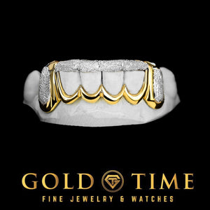 Two tone 6 piece grillz on a dental model with yellow gold box canines and diamond dust window panels, Gold Time logo below