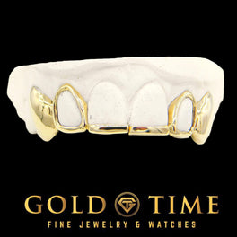 Custom 6 piece yellow gold grillz with a solid tip bar, open face laterals and solid canines on a dental mold, Gold Time