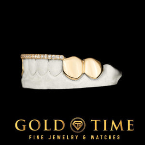 Side view of the 8 piece gold grill showing the solid canine and bicuspid caps and the moissanite tip bar