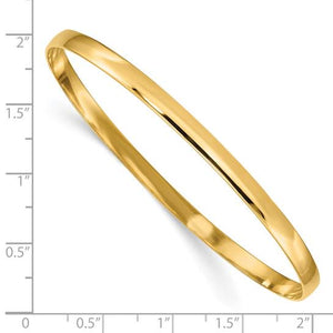 14K gold 4mm bangle beside a ruler, measuring about 2 inches across