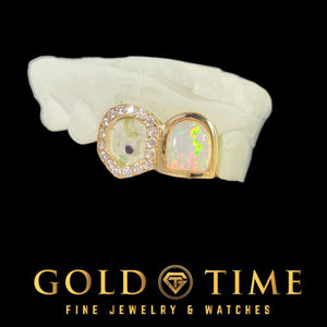 GoldTime Fine Jewelry & Watches logo with a gold grillz featuring opal and diamond stones on a black background