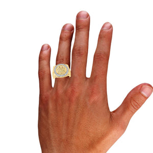 Man's hand wearing the 10k gold lion head diamond ring for scale