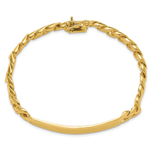 14K gold curb link ID bracelet in a round shape, showing the curved ID plate