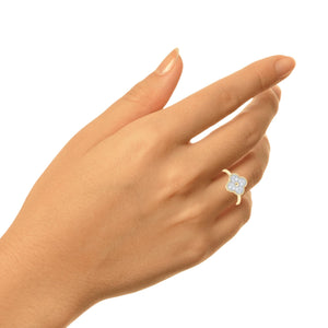 Hand wearing the 10K gold diamond four leaf clover ring