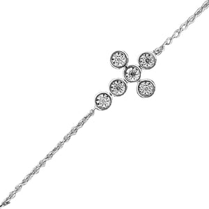 Close view of the diamond cross made of five pave set circles on a thin chain