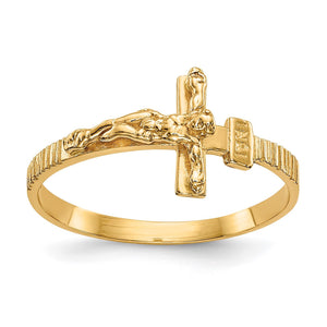 Gold ring with crucifix design on a white background
