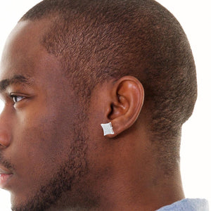 Man wearing a white gold kite square diamond stud earring