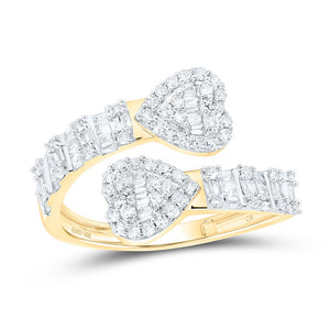 10K yellow gold bypass ring with two diamond pave hearts and baguette set shanks