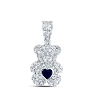10K white gold diamond teddy bear pendant with a heart-shaped sapphire