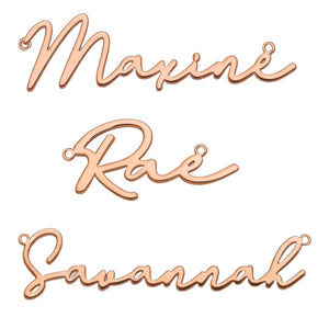 Rose gold script name necklace nameplate samples in a flowing cursive font