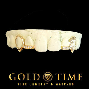 Custom 4 piece gold open face fang grillz with cut-out canines and moissanite-lined incisor tips on a dental mold, Gold Time