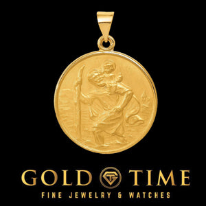 18K yellow gold Saint Christopher medal showing the saint carrying the Christ Child, on a black background