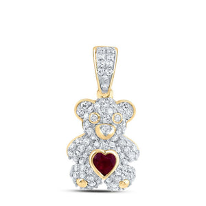 10K yellow gold diamond teddy bear pendant with a heart-shaped ruby