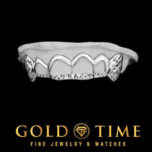 Window style grillz with trillion cut tips and canine fangs