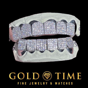 White silver CZ block grillz, top and bottom sets, fitted on a dental model