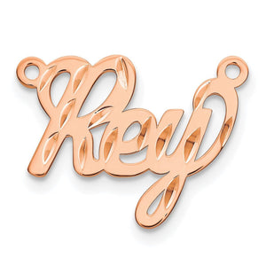 Rose Rey cursive nameplate with diamond-cut texture, close-up on white