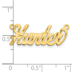 Yellow gold Hunter cursive nameplate against an inch ruler, about an inch wide