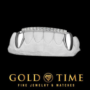 6 piece white metal bottom grill with solid canines and a moissanite tip bar across the front teeth
