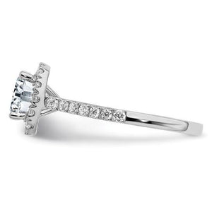 Side view of a 14K white gold cushion moissanite halo engagement ring with moissanite along the band