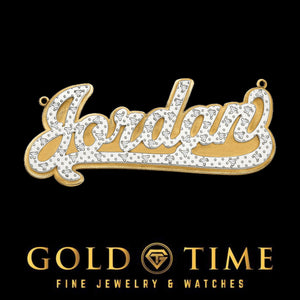 Close view of the 3D name pendant showing diamond set lettering raised over a satin gold backplate