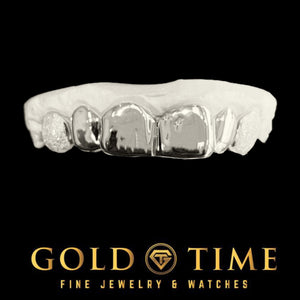 Silver 6 piece grillz with solid polished fronts and diamond dust canines on a dental mold