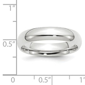 White gold 5mm comfort fit wedding band beside a ruler showing its width