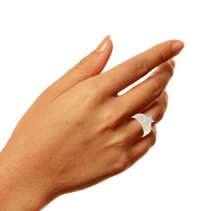 Women's diamond engagement ring and band worn on a hand