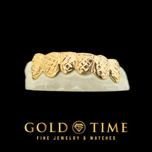 Front view of the six piece trillion cut box design grillz showing the repeating cut grid