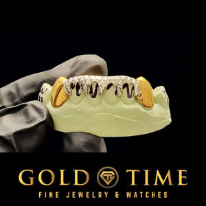 Two-tone drip grillz on a mold, angled view
