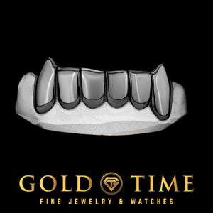 Black fang grill with 'Gold Time' branding on a black background