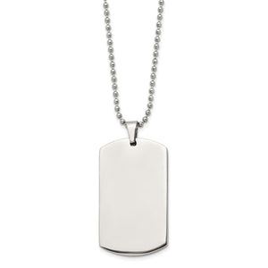 Angled view of the stainless steel dog tag showing its thickness and ball chain