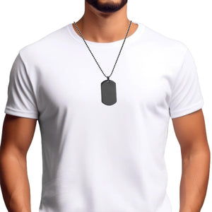 Man in a white tee wearing the black stainless steel dog tag necklace