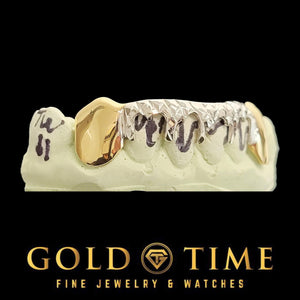 Bottom six two-tone grillz with yellow canines and white trillion drip center on a mold