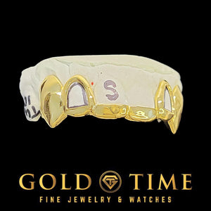 Gold grillz on a white background with 'Gold Time' branding.