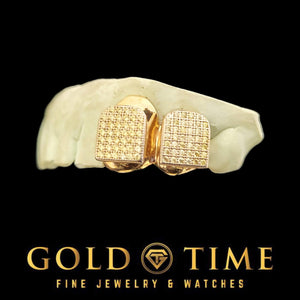 CZ block double cap grillz in gold plated silver, two neighboring caps fully set with cubic zirconia, on a dental mold