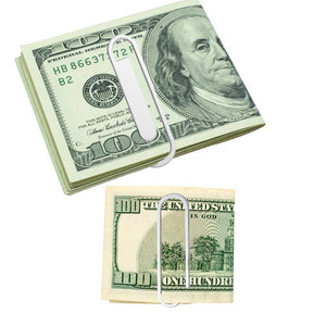 Sterling silver paperclip used as a money clip on folded bills