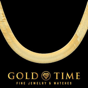 10mm 14K yellow gold flat herringbone chain laid in a curve on a black background