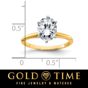 Oval moissanite solitaire ring next to a ruler for scale