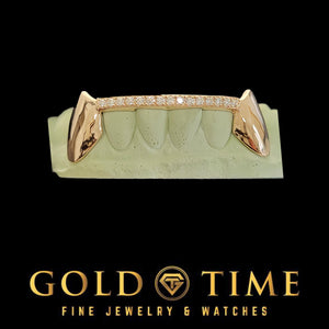 Front view of custom rose gold fang grillz with moissanite tip bar