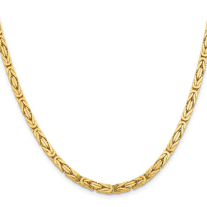 10K yellow gold Byzantine chain laid in a curve