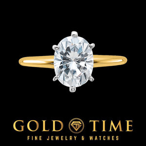 Top view of the 2.1 carat oval moissanite in six prongs on a yellow gold band