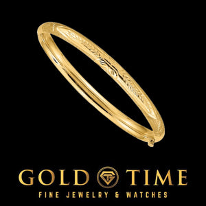 14k yellow gold Florentine baby bangle with engraved texture pattern