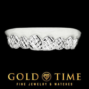 Top 8 piece silver grill with full trillion diamond-cut pattern on a dental mold