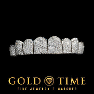 Front view of a fully iced 8 piece honeycomb moissanite bustdown grill with perm cuts