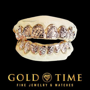 14-piece two-tone trillion cut grillz set